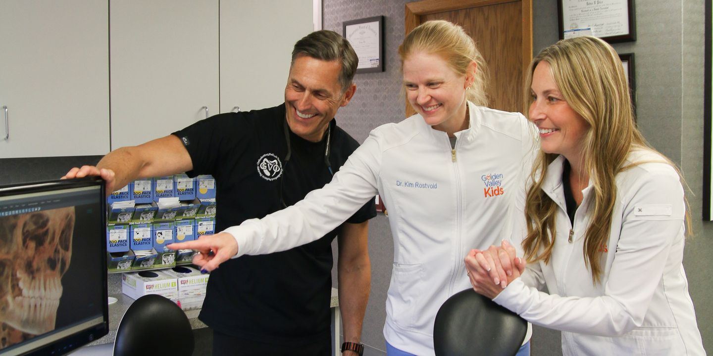 Golden Valley Kids team reviewing dental imaging